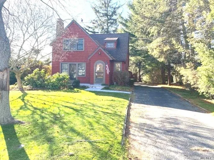 Charming Custom Craftsman Colonial on quiet country lane.Nice layout with Living / fireplace.Formal dining room leads to new paver patio overlooking 164 foot deep quiet yard.Updated gas heat and hot water from street.New front walkway and landing area Original moldings, staircase, hardwood floors and round top front door..Unique home worth seeing in great area.