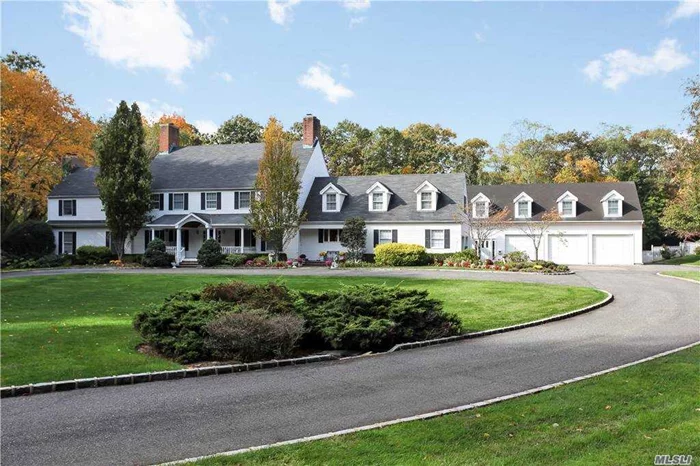 Oyster Bay Cove located on 5 acres, col-de-sac. This classic, gracious colonial is approached by a long meandering driveway. Total privacy. Separate 3+ detached garage. New owner has choice of Syosset or Oyster Bay/E. Norwich SD, Taxes shown reflect Oyster Bay/ E. Norwich S