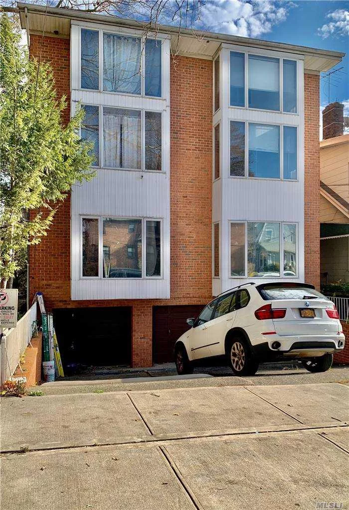 930sf Modern Duplex Condo Featuring 1 BR, 1 BA, Huge Living Room, Balcony, Skylight, 1 Garage/Driveway, Central A/C & Heat. Laundry Room In Basement, Common Charges $204/Month Includes Water, Sewer, Trash Pick-up & Common Insurance Policy. Convenient Location, 1 Block To Bus On Sanford Ave., 3 Blocks To Murray Station LIRR