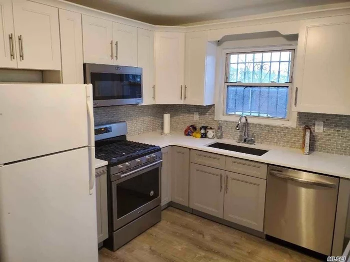 Fully Renovated 1st floor one bedroom. All Utilities are included, no pets, street parking .