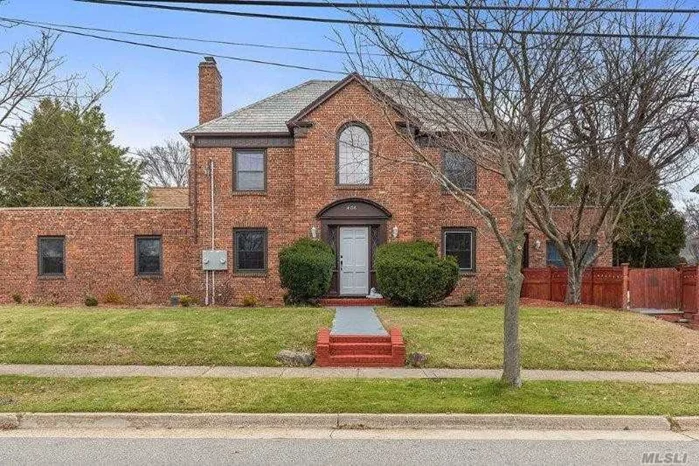 Large brick home waiting for a large family and or a professional office. Perfect location , close to transportation, shopping and lots more. This home boasts 4 bedrooms, 3.5 bathrooms. Has a separate entrance and great for entertaining. One of a kind. The seller is now ready to make a deal!