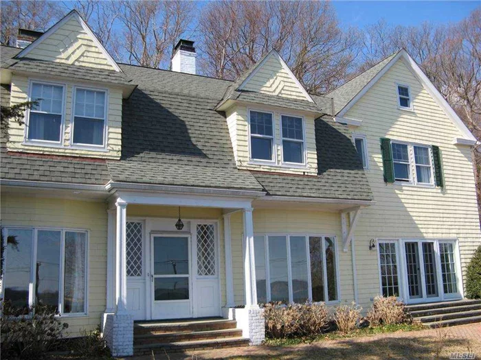 This 1913 Colonial is One of the Original Vanderbilt Sisters Home, 5 Bedrooms, 4.5 Baths, CAC, Fabulous Water Views From This Sun Filled Home.