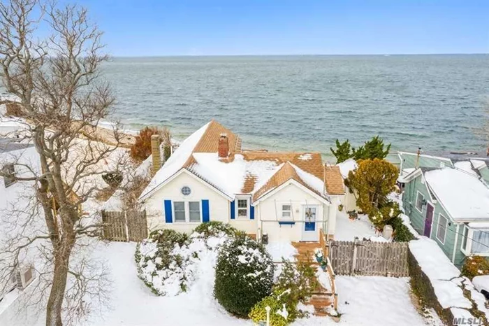 Wonderful Beachfront Cottage 2Br, Bath, Living room with Fireplace EIK, spacious waterfront Room with sliders to large wrap deck with awning, outside hot & cold water shower