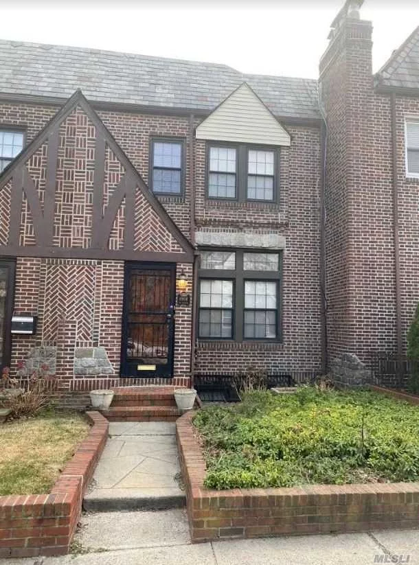 A BRICK 2 FAMILY B3 TUDOR, WITH 2 ORIGINAL WOOD BURNING FIREPLACES, EACH FLOOR HAS 1 BEDROOM APARTMENT , FIRST FLOOR AND BASEMENT NEED WORK, 2 ND FLOOR IN VERY GOOD CONDITION, KITCHEN WITH STAINLESS STEEL APPLIANCES AND GRANITE COUNTERS , HARDWOOD FLOORS , THERE IS A DECK ON TOP OF GARAGE COMING OUT FROM THE 1ST FLOOR KITCHEN , NEAR SHOPPING AND TRANSPORTATION