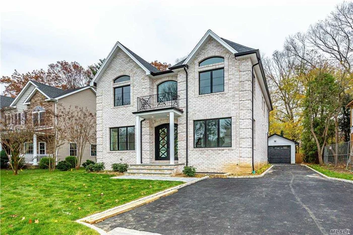 New Const. Energy Star All Brick Col, Mid-Block Loc On Oversized Lot. Top-Of-The-Line Amenities, 4.5 Designer Baths, Completely Finished Bsmt W/Br, Bth, & Large Playroom W/Staircase To Backyard. Pella Windows Throughout, Roslyn School District.