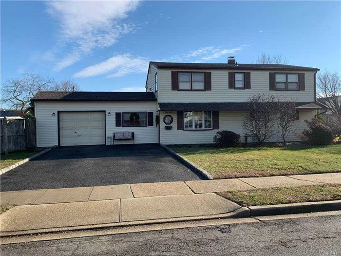 Taxes with basic star 15109.70 Perfect Home For a Large Family. 6 Bedroom, 2 Bath Colonial, Oversized Corner Property on a Quiet Block. Large Formal Dining Room. Plainedge Schools. Updated Kitchen with granite counters and cherrywood cabinets.