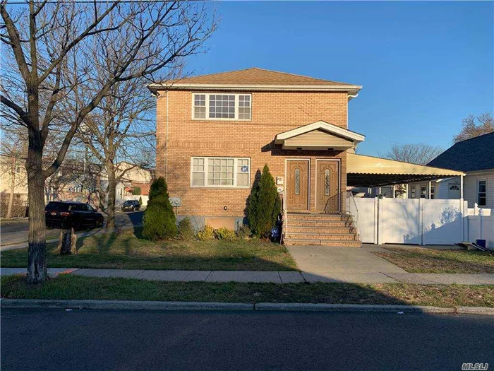 Freshly Painted Apartment On 1st FL: 3 Bedrooms, 1 Full Bath, Living/Dining Room, Kitchen, Hardwood Flooring Throughout With Stainless Steel Appliance. ( Fridge, Stove & Microwave).