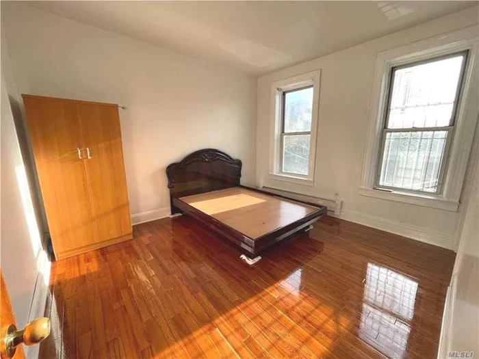4 Bedrooms Apartment at a Great Location Close to Shops and MR trains. 2FL, Heart of Elmhurst, Tenants pay for Electricity Only. Big windows and hardwood floors throughout. Spacious Kitchen with Brand New Appliances. Parking available in the front driveway for $200. Pets not allowed.