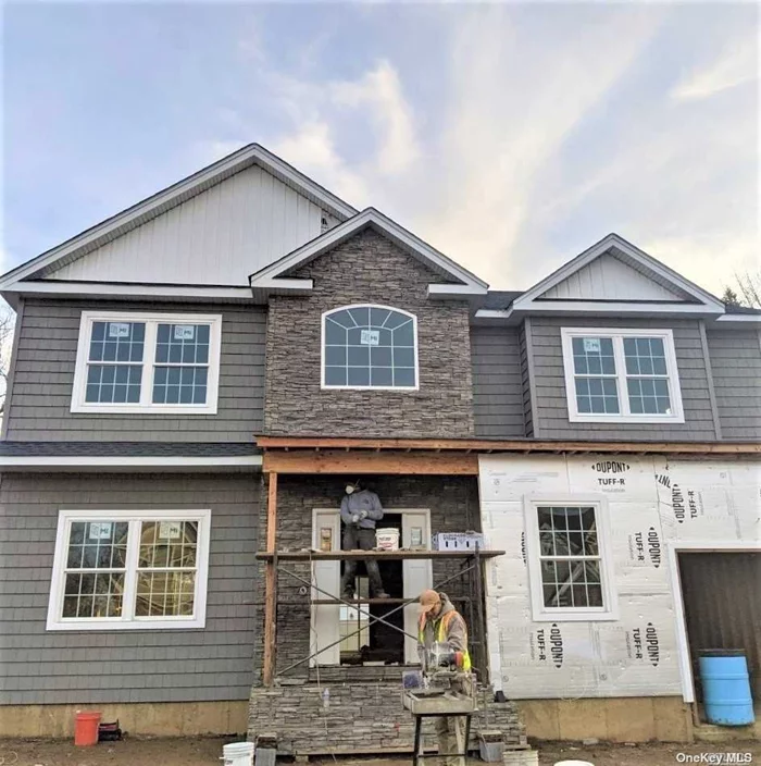 New, under construction in Massapequa Schools/BL elem, conv to transp/shopping/library. Polo Estates 4 bedrooms, 3 full bath colonial on 7, 200+ sqft lot. Main level office/guest room, garage & full bsmt. Laundry on bedroom level. Actual pix to be updated as compl, some of model home. Sumptuous master suite w/2 walk in closets & large master full bath w/stand alone tub & sep shower. 3 large add brs w/a dbl closet in each. Wainscoting thru-out main level, tray ceil in dining rm & gas fireplace in den. Sod in front & IGS. Est completion in early Spring. Can customize still.