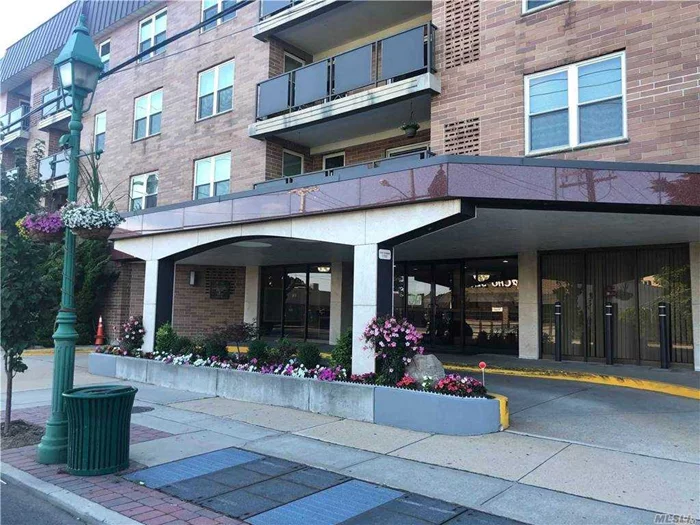 The Perfect Location In The Heart Of The Five Towns. Close To LIRR, Shops, Restaurants & Houses Of Worship. Beautiful 1BR, 1.5 Baths. Apt W/Terrace & Lots Of Closets In Luxury Elevator Bldg W/24HR Doorman & IG-Pool. Laundry & Storage Rm On Same Floor As Apt.