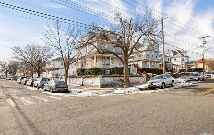 Amazing opportunity to own this 2 Family Home on an Oversized 6, 000 Sqft Corner Lot in South Ozone Park. The Home is Zoned as R3-2 and can currently be expanded from 2, 450 to 3, 000 Sqft. It Can also be Turned into a 3, 000 sqft Single Family Home. The home offers a Huge Backyard, 2nd-floor apartment with outside entrance, 3rd story with 3rooms unfinished attic, and a Full Finished Basement. Separate Hot Water Heater, Natural Gas, Gas Cooking & Gas Heat. Other structures include a detached shed, tiki bar, and covered deck. Fully fenced yard. Close to Bus, Railroad, Shopping, Park, and JFK Airport.