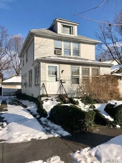 Detached one family 35.58x100 property with 2 car garage. Needs updating, sold as is condition. Newer roof, updating heating system. Hardwood floors, stainglass windows, walk up attic.