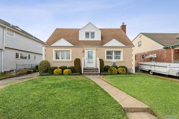 Charming cape cod style home on tree lined street. Home features 3 bedrooms, 2 full bathrooms, eat in kitchen and family room. Full basement with laundry. Private driveway. Close to parkways and shopping,  LOW TAXES! A perfect place to call home.