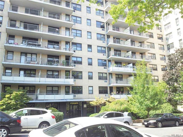 Rare opportunity to own a Spacious 1 BR with Balcony at a Great location in Woodside. This apartment has Separate Kitchen, Entry foyer, Dining Area, Large living room with exit to the Balcony, Spacious Bedroom with a large closet and Bathroom. There are 3 large closets and the apartment is very bright and sunny. This apartment is waiting for your touch. The Apartment and the Balcony are facing East and there is spectacular open view over Queens. Great opportunity to enjoy morning coffee and self-entertain at the Terrace. No pets allowed. Maintenance Includes Water, Heat, cooking gas and tax. The Building is well-maintained and its amenities include an Elevator, On-site Super, Intercom System, Laundry Room, Bike room, and newly renovated Indoor and Outdoor Parking. Located on the Woodside-Sunnyside border, it is at the heart of diverse restaurants, bars and shops. Quick commute to midtown Manhattan, only blocks away from the 7 Train and close to LIRR. Great location!