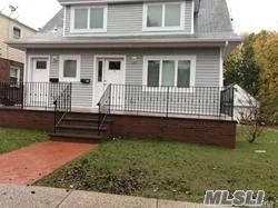 Beautiful 2nd Floor 2 BR apartment, Laundry in Unit, CAC, Use of yard. Off street parking. Close to LIRR and Shopping. LI requires credit check and proof of income.