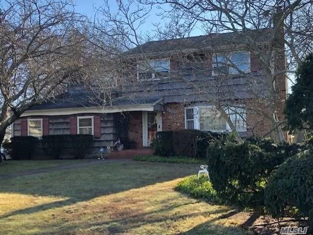 Location, location, LOCATION!! Bring Your VISION to This Spacious Colonial in Pamoqua Estates, a Prime South of Montauk Neighborhood. Hardwood Floors, Well-Sized Rooms, Full Basement, Shy 1/2 Acre. Come On Down...The Price is Right to Make This YOUR Dream Home!