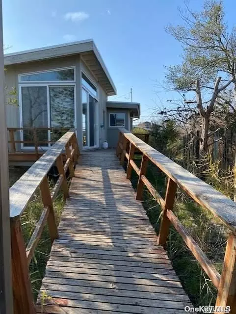 Charming 3 Bedroom, 1.5 Bath! Large Deck, Great Seaview Location! Close To Town! Has Direct TV and Wifi! Along With 4 Bikes For Your Use!