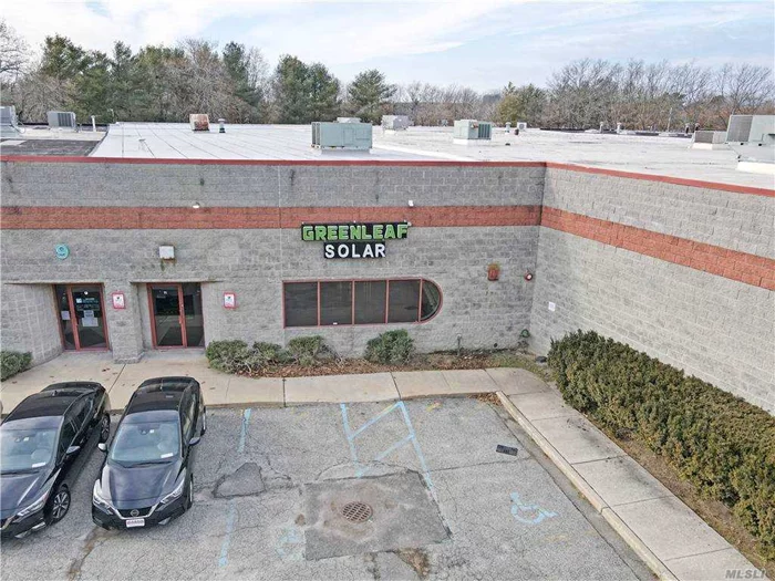 Large 5600 Sq Ft Building, approximately 50% (2600) beautifully finished office space with CAC, secure entry foyer, 2 bathrooms, large reception area plus additional 6 separate offices and kitchenette. The remaining square footage is heated warehouse space with 16&rsquo; Overhead Loading Door and storage. Roof Replaced 11/2018. Common Fees $8350 per Year. 9 Guaranteed Parking Spaces in front and on side and rear