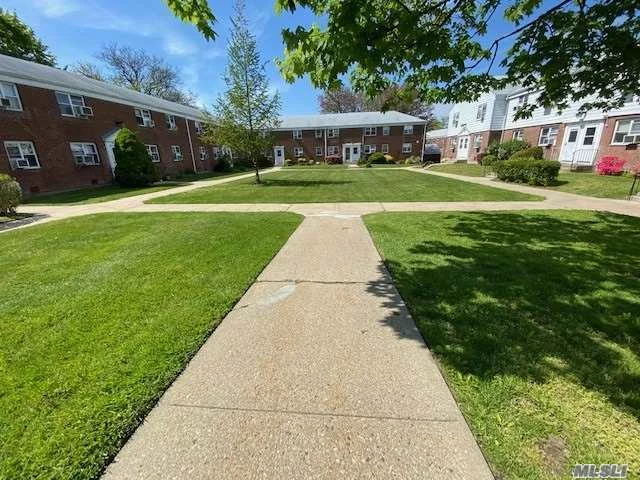 Coop 2 bedrooms garden apartment upper unit , Full Bath, Attic For Extra Storage Space. washer&Dryer installed in unit. , 5 Burner stoves , SS appliances , School District#26, PS/MS 74.Bus Q88/27, QM 5/8/35, Close To All Shops/Coffee Stores/Bank/ Grocery Store, low maintenance fee includes all except electric.BBQ area in courtyard .5% Flip tax pay by seller , No dog , no sublet , owner occupied must. income requirement needs , qualified buyer allows as low as 10% downpayment .parking sticks $20/1st car monthly . garage on wait list .