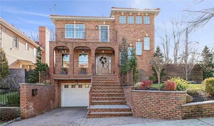 Newly built in 2013, custom brick home with terracotta roof on a corner lot located in prestigious Bayside School District #26. Located in a secluded and quiet neighborhood with lots of sunlight, spacious interior living space with a large backyard that is perfect for entertaining. Open floor plan with lots of natural light, wood floors, custom crown molding, architectural featured windows with custom silhouette blinds and high-quality light fixtures throughout. So much more about this property must see in person to appreciate!