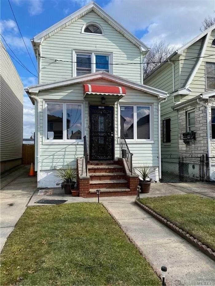 Charming one Family with 3 Bedrms and 1 1/2 Baths in the heart of Jamaica/Ozone Park offers basement for storage has large backyard and can fit 2 cars in the driveway. Close to transportation and local shops.