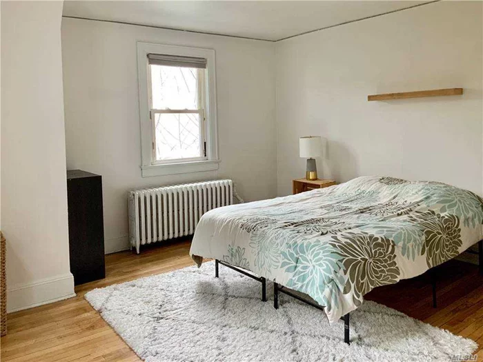 Sunny, spacious, and airy one bedroom duplex in the heart of Bayside. First floor includes open kitchen flowing directly into living room and dining area. Second floor features a large bedroom with a walk in closet and two additional closets and full bathroom. All utilities included, access to lovely patio. Minutes to LIRR, buses, highways, shops, and restaurants.