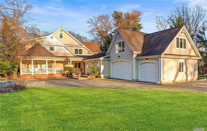 Diamond Colonial on 1.78 Acres of flat property. On private cul-de-sac less than 1/2 mile to the LIRR. Grand custom eat-in kitchen w/gas cooking. Custom Millwork throughout. Radiant heated Bathrooms. In-ground pool, outdoor kitchen. Great home for entertaining! Award winning Syosset Schools. 2022/2023 TAX GRIEVANCE SETTLED PRICE REDUCTION ABOUT 18%!!!!