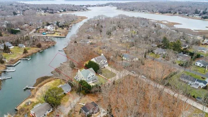 This beautiful home located at the end of a private road was completed in 2011, and designed to enjoy water views from all main living areas in the home. Enjoy morning coffee as swans swim by just outside the oversized windows. Sliding doors lead to maintenance free decking and new heated pool. Private dock is perfect for launching kayaks and small crafts. 1st floor boasts oversized rooms & high ceilings. Family room with fireplace, gourmet eat in kitchen with high end appliances, Bosch dishwasher and latest technology induction stove & convection oven. Master Bedroom ensuite has two walk in closets fitted with closet systems, large master bath with separate tub and shower, balcony overlooks pool and Goose Creek. A Jr. master suite with walk-in closet and ensuite bathroom. 2 additional large bedrooms, full-bath, laundry. Full dry basement with high ceilings, great for storage or can be finished. This house has it all-a must see for any family looking for the perfect North Fork Home.