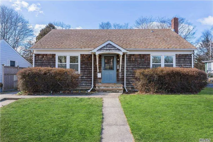 Ranch home in one of the finest locations in Greenport on 6th Street. Step on the sidewalk and view the water at the end of 6th Street where a beautiful park and beach await you. This cedar shake shingled home has a comfortable and cozy layout with its original hardwood flooring. Nice back yard with shed included.