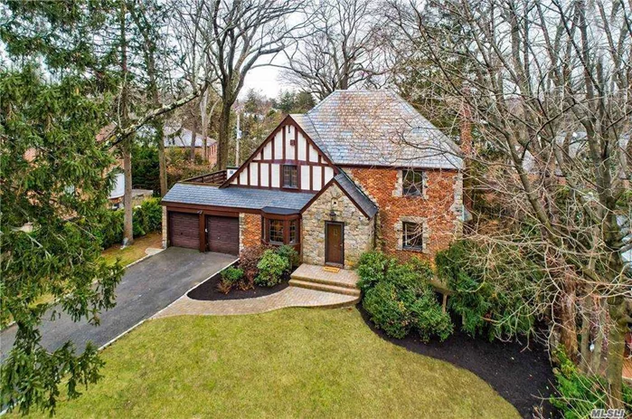 Pristine & sparkling, this beautiful CH Tudor is ready to occupy & features 4 BRS & 3 Full BTHS. The 1st flr with well-scaled rooms, boasts a welcoming foyer w/a curved staircase & LR w/wbfp & French doors which open to the exterior deck. The FDR w/gracious window seat is perfect for entertaining guests. Sunny kitchen offers large breakfast area. Full bath & BR/Office complete the 1st level. Upstairs is a generous master suite, 2 bedrooms & hall bath. Hardwood floors throughout, attached 2-car garage, and Munsey Park Elementary School. Preferred membership to the Strathmore Vanderbilt Country Club offers a buyer the experience of a lifestyle, which includes elegant clubhouse, year round dining, children&rsquo;s summer camp, pool and tennis (fee). Truly a must see.