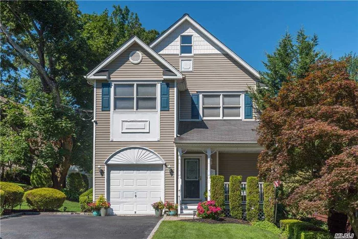 PUBLIC OPEN HOUSE SATURDAY 2/13. APPOINTMENTS ARE NECESSARY PRIOR TO ENTRY. PLEASE SEND APPT REQUEST, PRE-APPROVAL AND COVID TO 516-581-6118. Move right in to this picture perfect Colonial with covered front porch on .17 acre. Built in 2001, this home features all of today&rsquo;s modern amenities, hardwood floors throughout, and an open concept living space with adjoining eat-in kitchen/family room with fireplace and glass sliders to rear patio. Large master bedroom with vaulted ceilings, master bath and dual walk in closets. Fully finished walk-out basement with wet bar, laundry room, recreation/office space, and full bath. Corner lot with fully fenced backyard and paver patio. Conveniently situated less than 1 mile to Huntington Village with a vibrant restaurant and shopping scene, and Heckscher Park. Don&rsquo;t miss this incredible opportunity!