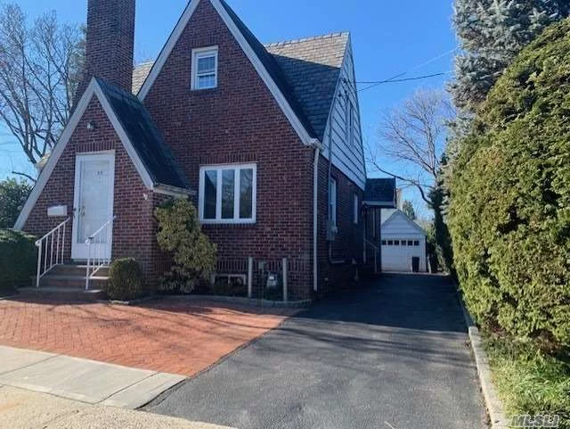 Renovated 4 Bedroom, 2 Full Bath Brick Colonial. Hardwood Floors, New Appliances, Full Basement With Washer/Dryer & OSE. Amazing Backyard. Close to Train, Town And Stores.