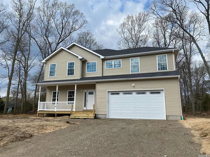 Custom built Colonial - features hard wood floors throughout. 9 ft ceilings on the first floor. Living room with fire place. White shaker cabinets with granite counter tops to be installed. 2 car garage on this model, CAC, full basement and more! Must see.