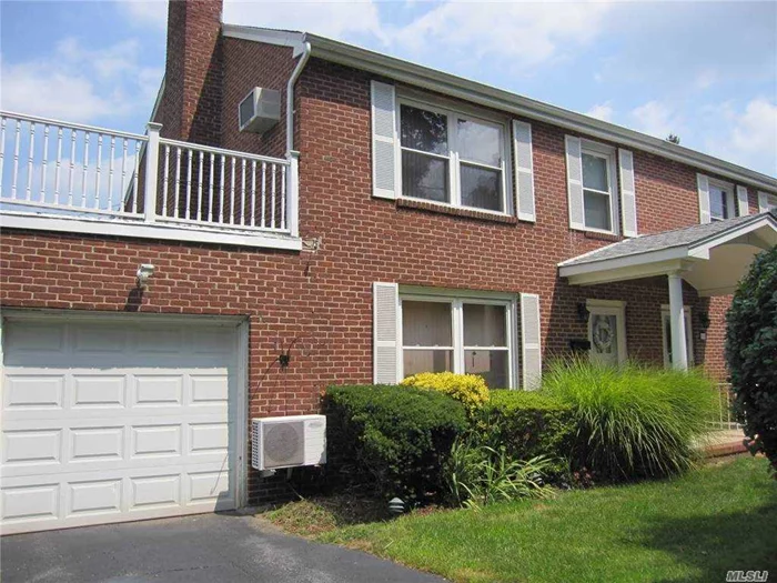 Beautiful Sunny 3 Bedrooms 2.5 Baths Semi-Attached Colonial In Manhasset Schools! Charming Living Room With Fireplace, Formal Dining Room, Eat In Kitchen, Hardwood Floors Throughout, Attached Garage And Two Additional Off-Street Parking, Professional Landscape.