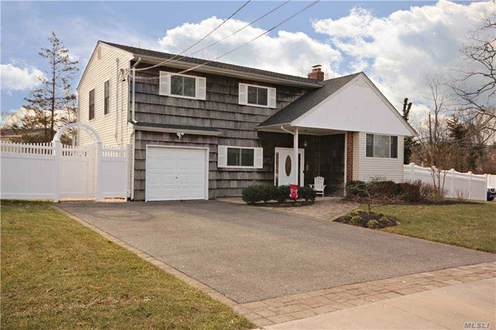 South of Montauk! Beautiful 4 bedroom Colonial with Renovated Eat-in kitchen with Stainless Steel Appliances and Oversized Kitchen Cabinets. New PVC Fenced in Backyard with Patio and Inground Sprinklers. New Roof. Great house for Entertaining!  Close to a Beautiful State Park and East Islip Marina.