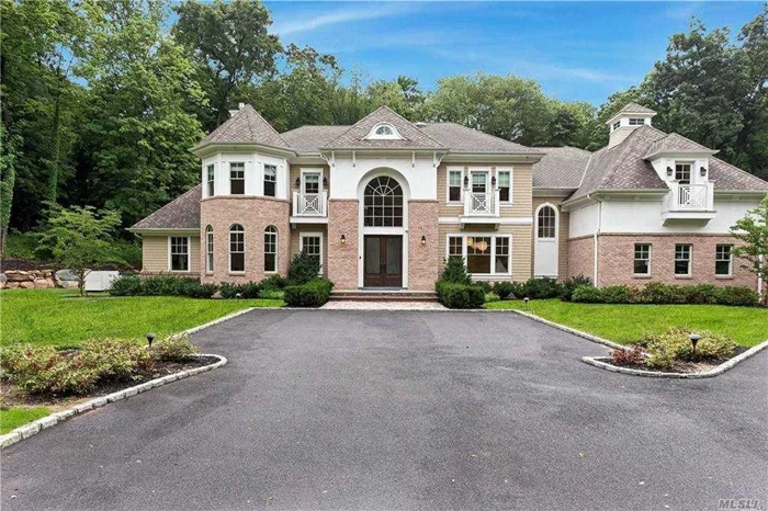Brookville. Spectacular Newly Constructed Brick & Shingle Colonial Featuring the Highest Quality Construction with Fantastic Modern & Transitional Design. Beautiful Trim & Moldings Compliment Every Room of This Sun-lit Gem. Stunning 20 Foot Foyer with Carrara Marble Floor, Over-sized Proportioned Rooms. Set on the Most Serene Private 2+ Acres with 3 Car Garage, Full House Generator, Smart Home, Water Filtration System, Radiant Heat and Elevator Ready.