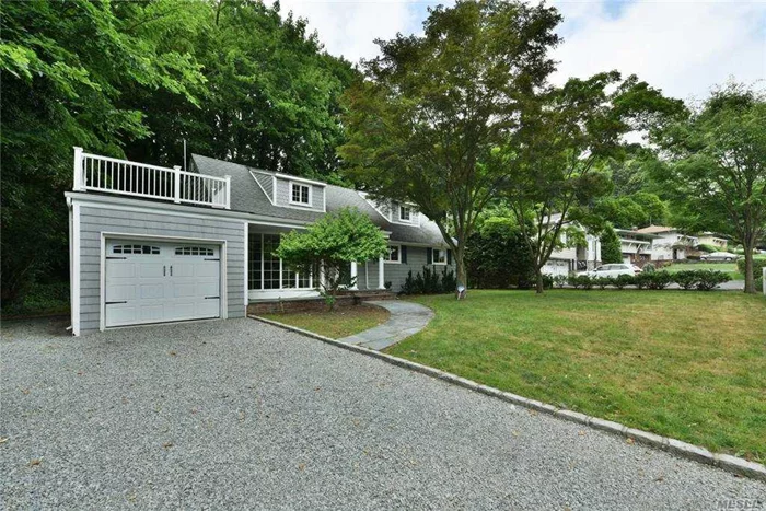 Beautiful Cape in the heart of Sea Cliff. This home features a gorgeous Eat In Kitchen with marble island, stainless steel appliances, hardwood floors throughout, water views from brand new 2nd floor deck and fireplace. Nice size backyard, attached 1 car garage.