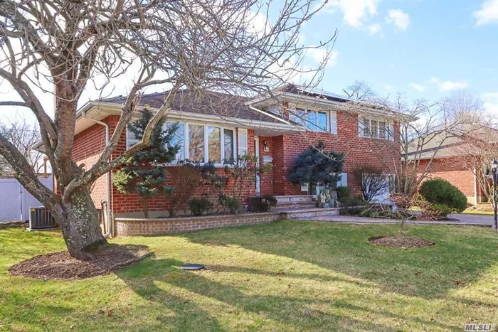 Pristine split level in desirable Syosset Woods features 4-5 bedrooms, 3 full baths (one in the Master) w/ 2206 s.f. All major renovation completed in the past 2 years (2019-20), Brazilian Walnut HW floors thru-out the main floor; all freshly painted; an Open Concept new granite EIK w/counter seats for dining, new gas cooktop & built-in exhaust fan and new appliances; Brand new gas heating system & new cooling system; Newly redone in-ground vinyl pool with new system, new liner, new pump (2020), new brick pavers surrounded the pool & the patio, new wood deck off of the Dining Room, an extended DEN (18 x 22) w/skylight & fireplace, a finished Basement and so much more; SOLAR PANEL installed for energy cost savings; Willits Elem - Syosset Schools; Easy access to the library, schools, shopping and all major roadways; Taxes are NOT reflected with STAR savings of $1413., a Move-in ready home!