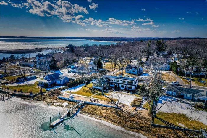 Laughing Water&rsquo;s largest waterfront parcel and newest reconstructed residence is graciously designed and painstakingly executed, with deep-water dock. A contemporary craftsman offering 20 +/- rooms, features 70 windows and 180-degrees of Corey Creek Harbor views, Hog Neck, and Little Peconic Bay, as well as East Hampton and Noyack! The 615 +/- sf rear deck hugs the house, and a wide pea-gravel patio flanks the slate-scoped retaining wall, deck and wall bracketing an inviting lush lawn, shade trees and curated plantings, perfectly highlighting the property&rsquo;s exquisite beauty, natural and improved.