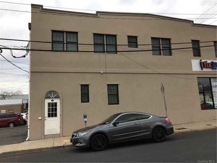 Renovated 2 Bedroom Apartment with Wood Cabinets, Solid Countertops and Stainless Steel Appliances. Very Close to LIRR and Town. Across the Street From Laundramat.