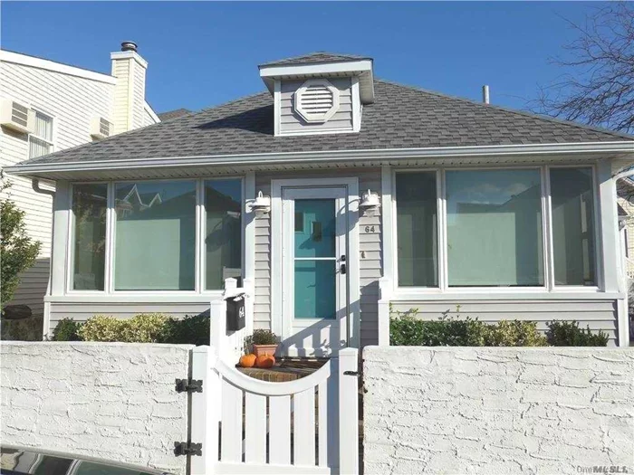 Long Beach West End Summer Rental. This bright and updated, furnished bungalow features open layout living room, dining area and kitchen with sliders to a spacious side yard, 3 bedrooms, 1 full bath, washer and dryer, and driveway parking. Terrific location close to the beach, shopping, restaurants and playgrounds.