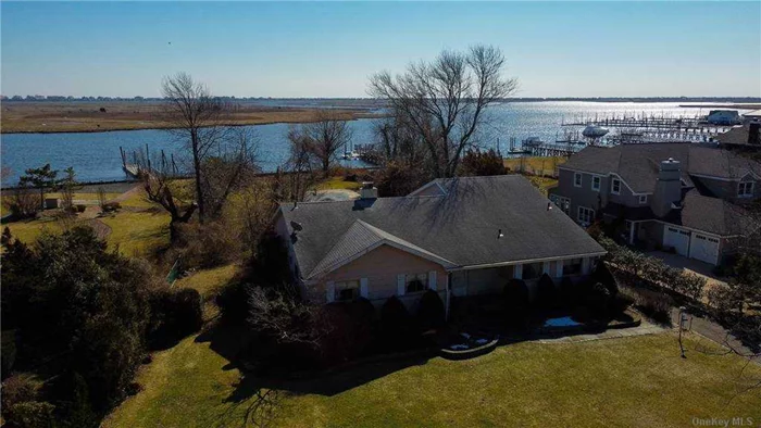 Welcome To .80 Acres Of Stunning Waterfront View! Custom Mid Century Ranch. Relax By The Stone Fireplace. Spend Your Summer Lounging By The Gunite Pool Surrounded By Sunset Of The Bay. Build Your Dream Home On This Park-Like Property. New Bulkhead 2012, New boiler 2019. Call For Private Showing. Award Winning Hewlett-Woodmere Schools. Sold As Is.