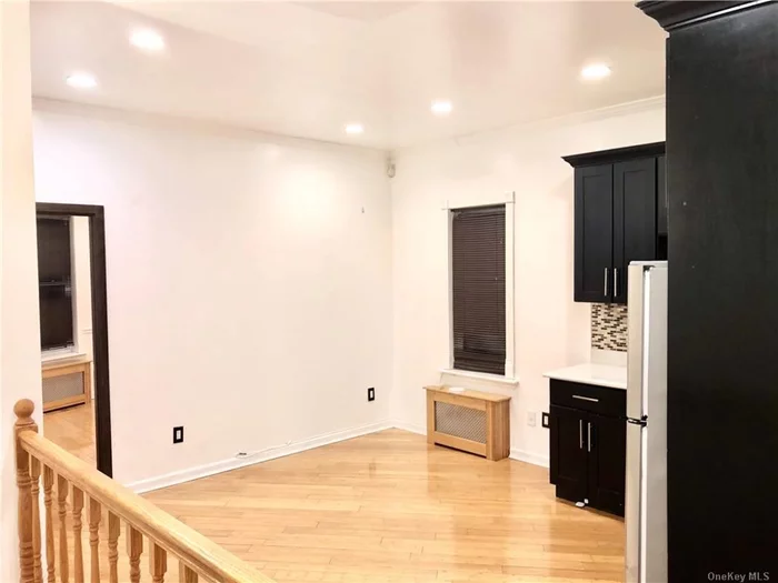 Located in an extremely desirable area of East New York, Brooklyn. The newly renovated house features a two-bedroom, kitchen, full bath, and a living room. Windows throughout, and lots of closet space. One street away from the train.