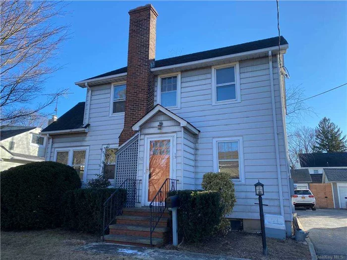 Welcome home to this beautiful Colonial! This 3 br, 1 1/2 bath home has gorgeous hardwood floors throughout. Large living room with wood burning fireplace, dining room, eat in kitchen and 1/2 bath on main floor. As well as a spare room on the main floor that could be used for extra living space. 3 large bedrooms with full bath on 2nd floor. A large walk up unfinished attic is certainly something to see as well! Side entrance from driveway leading to kitchen or full unfinished high ceiling basement. Let&rsquo;s not forget about the oversized 2 car detached garage for plenty of storage!