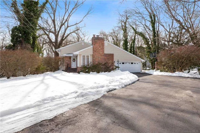 Lattingtown/Locust Valley - This beautiful Split Level style home on just short of .5 acre park-like property, which faces protected woods, sits on a cul-de-sac. Featuring an open floor concept eat-in-kitchen with stainless steel appliances, granite countertop, radiant heated floor, open to a spacious Den/Family Rm. Living Rm with wood burning fireplace and Dining Rm. Master bedroom with bath, 2 bedrooms, full bath, additional bedroom/office. Lower level has a great room, bedroom and full bath with a walk-out to patio/backyard. Possible M/D with proper permit. Basement with Laundry and extra room/gym. Plenty of storage space. Central Air, Generator, Sprinkler system. Outdoor BBQ. Room for a pool. Close to beach. Golf privileges at Glen Cove Golf Club. A Must See!