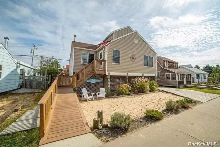 Completely Renovated Raised 4 Bedroom/2 Full Baths and Outside Showering Area. Home In The Heart Of Ocean Beach. Private Fenced Rear Deck With Outside TV, Large and Ample Seating. This Home Comes Perfectly Ready With Partial Bay Views, 4 Bikes, 5 Beach Chairs And A Wagon!