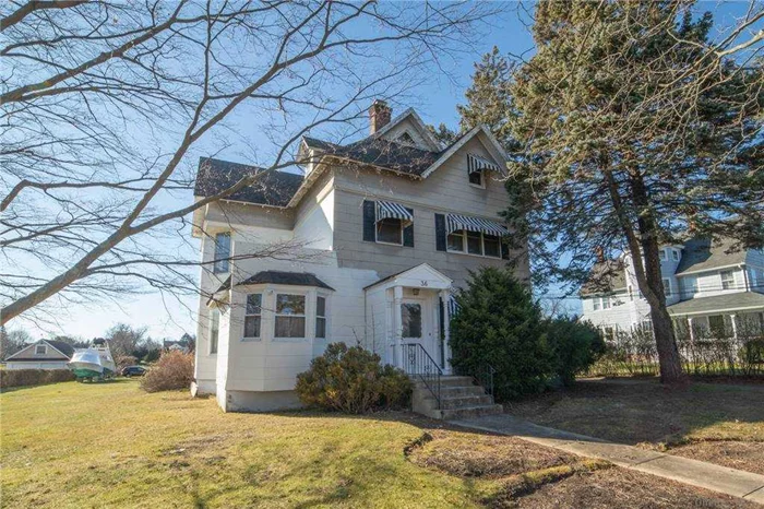 Beautifully Updated Waterfront Colonial , Featuring 4 Large Bedrooms, 3 Full Baths ,  Hardwood Floors , quartz Kitchen, Fireplace , full Basement and Full Attic , This Property has income Potential and has 10 income producing Boat Slips , Large Garage, all on a Shy Acre.