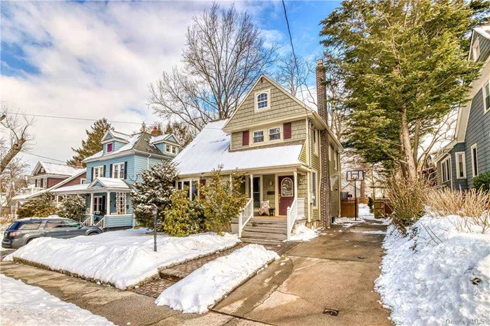 Charming, bright and updated 3 bed 2.5 bath colonial. Lovely living room, formal dining and den/office flow easily to spacious kitchen with large windows and sliders leading to an over-sized yard truly fit for fun. Sit by a fire pit on the patio and enjoy! Many updates including finished basement with full bath, boiler, hot water heater, updated bathrooms and more. Move right in! .3 miles to LIRR, close to all!