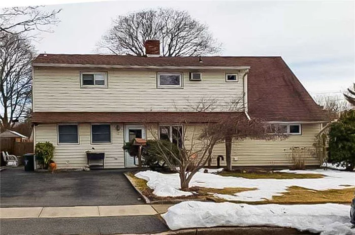 Expanded Ranch in Salisbury area with East Meadow schools featuring 5 Bedrooms 2.5 Bath in Westbury. Anderson Windows, Updated bathrooms, Boiler 2 years old, Roof 2007, Above ground oil tank Legal mother daughter Sun room 2 years old hardwood floors, Split units 2, Shed, Fenced yard .This house is sure to go fast and is close to public transportation.