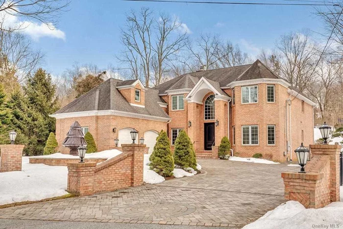 Walk Into This Custom Built 5, 000 Sq Ft Brick Colonial. This House Has It All, Including A Custom Gourmet Eik, Dual Onyx Fireplace, Full Finished Basement, ?Two Story Family Room, Custom Millwork, Radiant Heat & More! Outdoor Kitchen, Sitting Area With Fire Pit & Sports Court. Prestigious Landscaping Includes A Waterfall & Heated Inground Pool. This House Is a Must See! Won&rsquo;t Last!